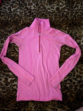 LULULEMON pink quarter zip. Small stains pictured on front hardely noticeable